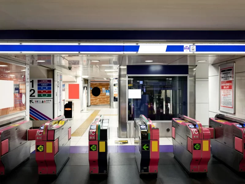 London Underground station sign in busy city center